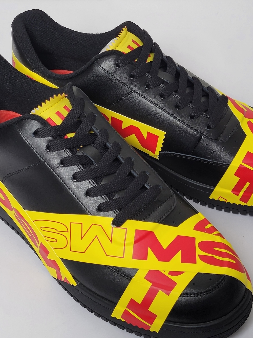 MSCHF Tap 3 Men's Black Athletic Sneakers with Yellow and Red Graphic Tape